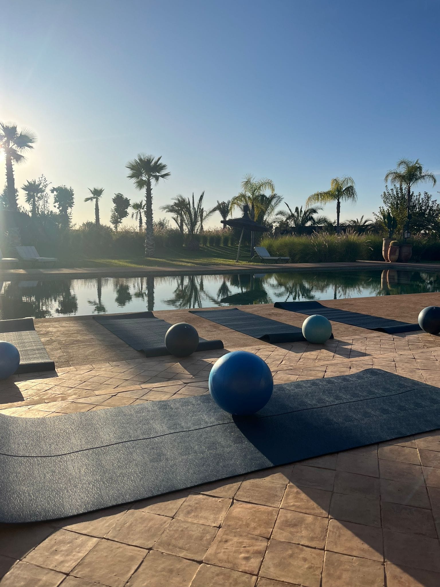 outdoor yoga classes wellness retreat Outdoor yoga class at a wellness retreat